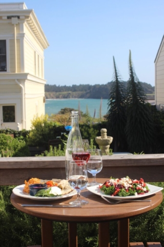 Dining on the deck with a view of the ocean at Trillium Cafe, Mendocino
